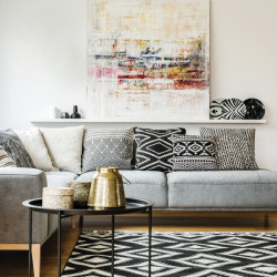 Bold comfort Mix-and-match pillows in bold patterns and textures create an inviting space.